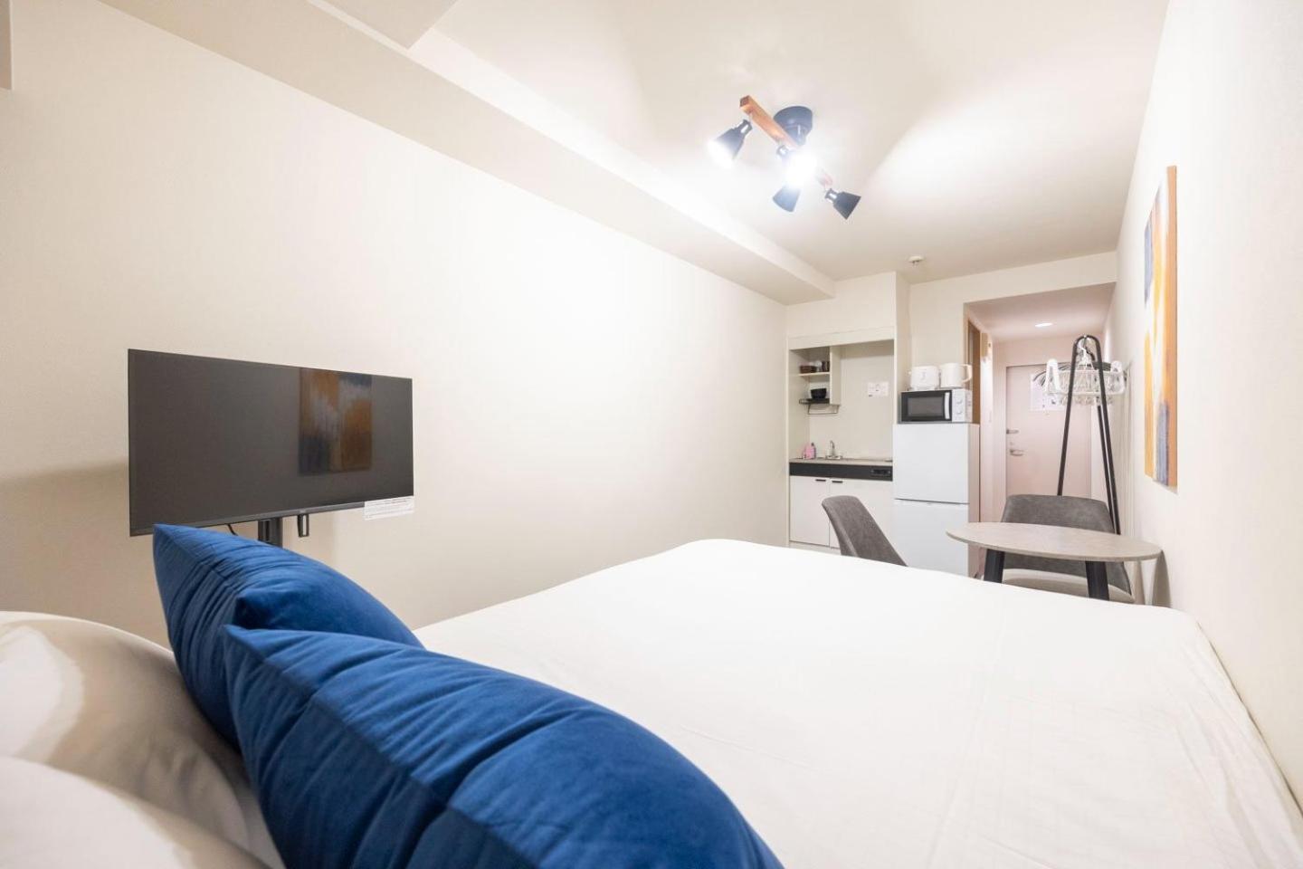 Ferienwohnung Shinjuku Okada Building Präfektur Tokio Zimmer foto
