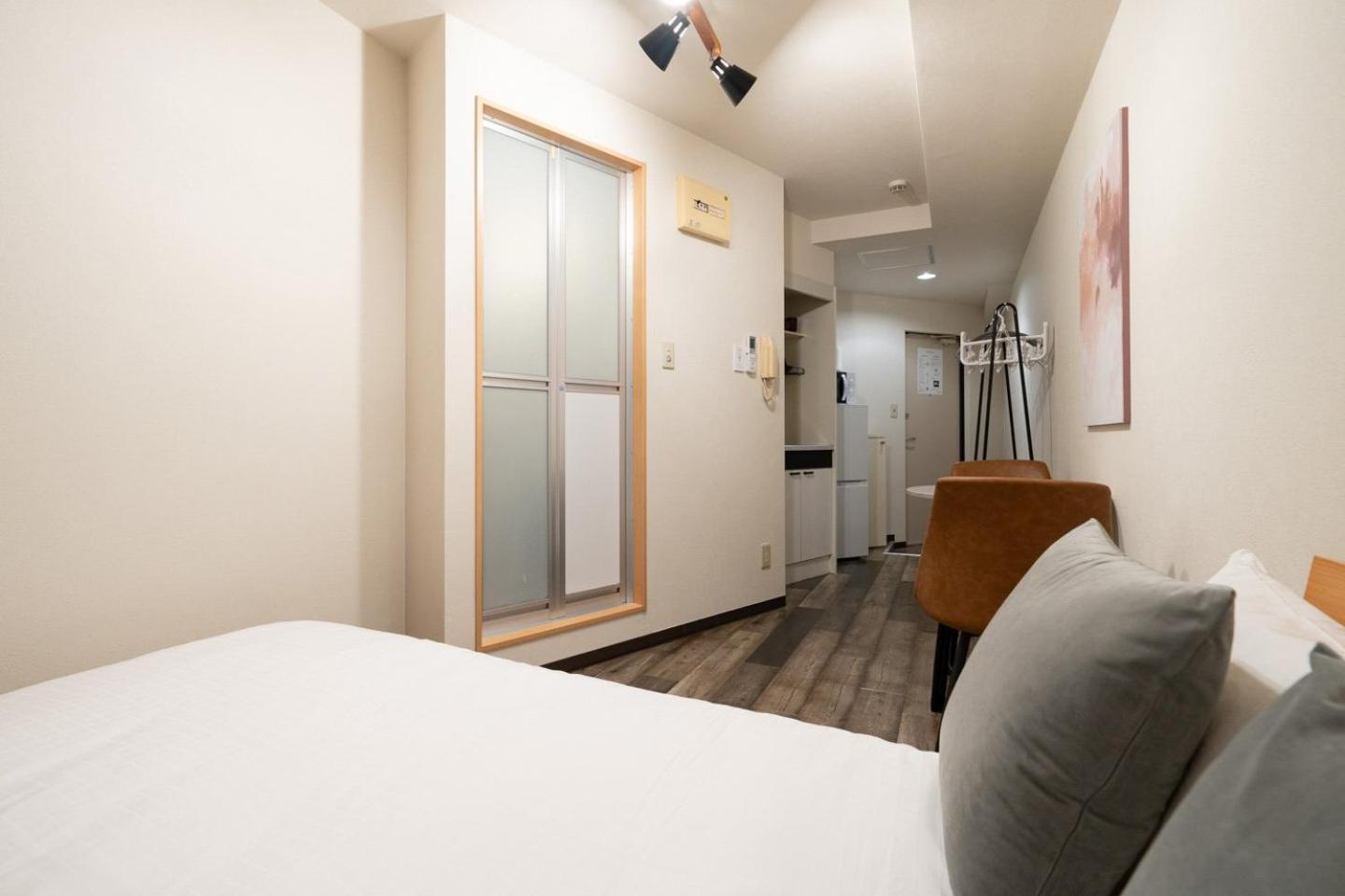 Ferienwohnung Shinjuku Okada Building Präfektur Tokio Zimmer foto