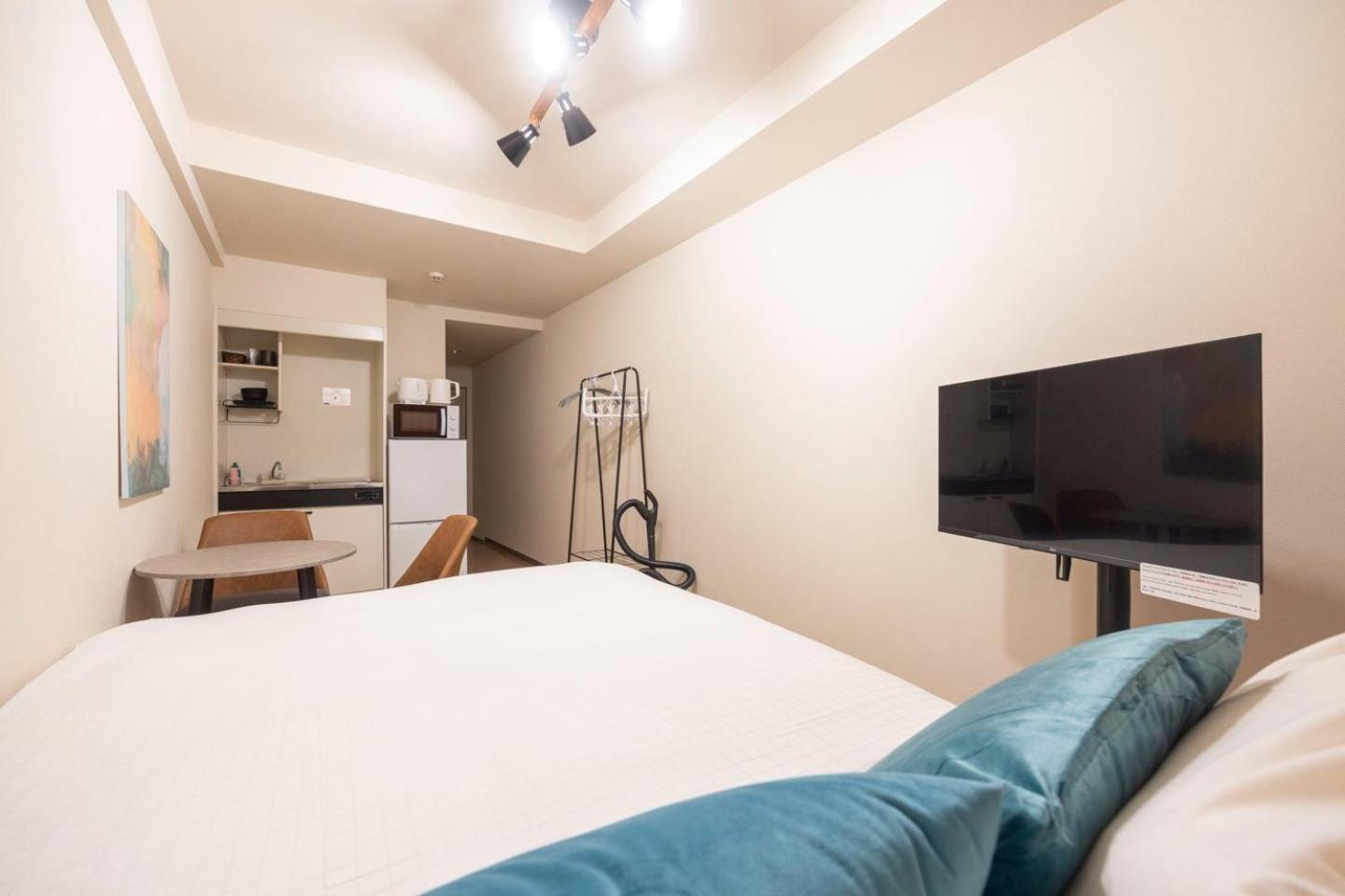 Ferienwohnung Shinjuku Okada Building Präfektur Tokio Zimmer foto