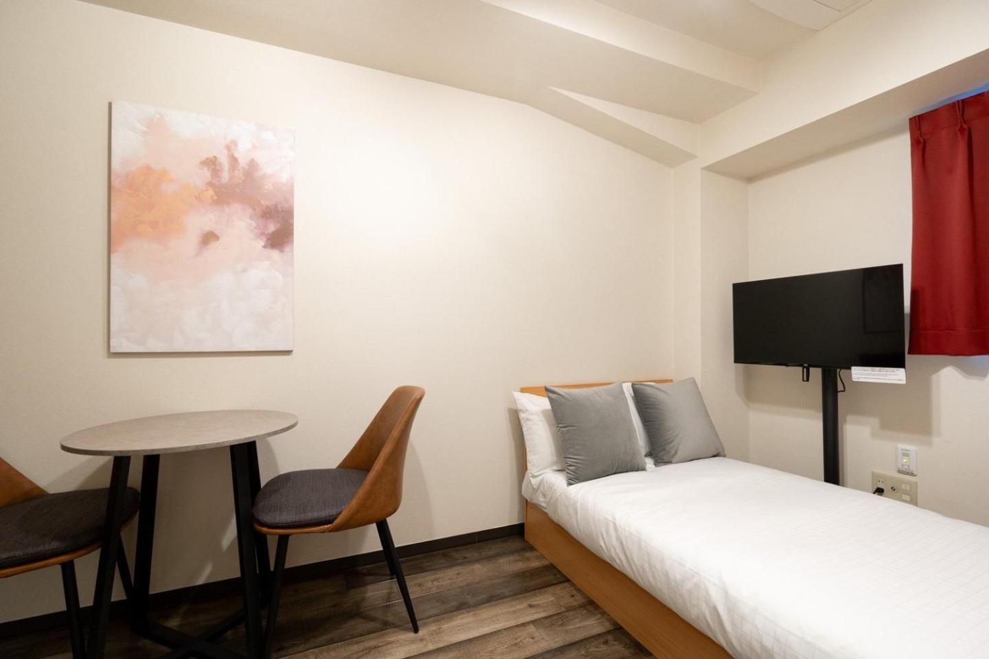 Ferienwohnung Shinjuku Okada Building Präfektur Tokio Exterior foto