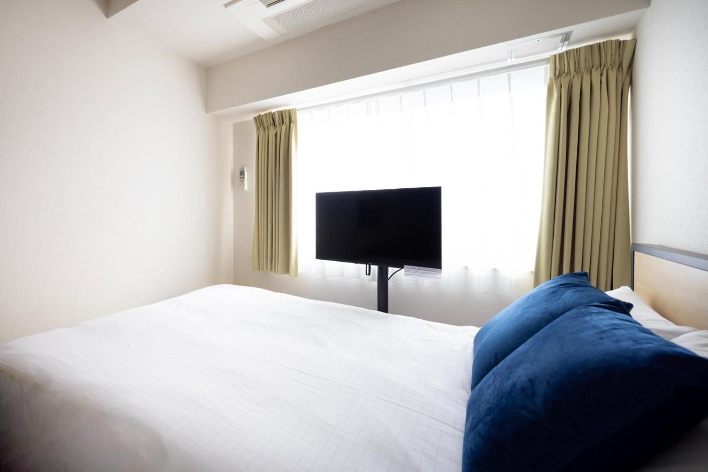 Ferienwohnung Shinjuku Okada Building Präfektur Tokio Zimmer foto