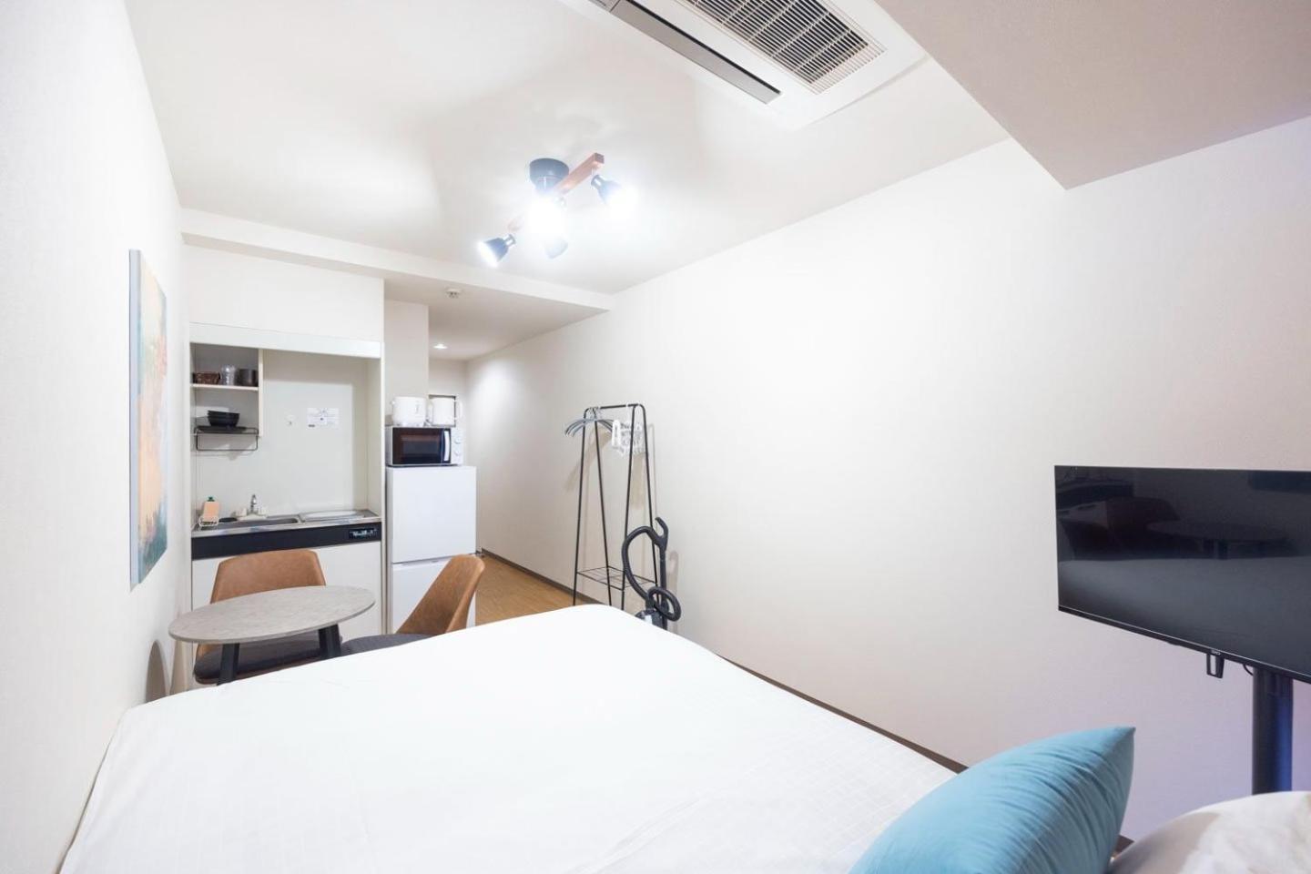Ferienwohnung Shinjuku Okada Building Präfektur Tokio Zimmer foto