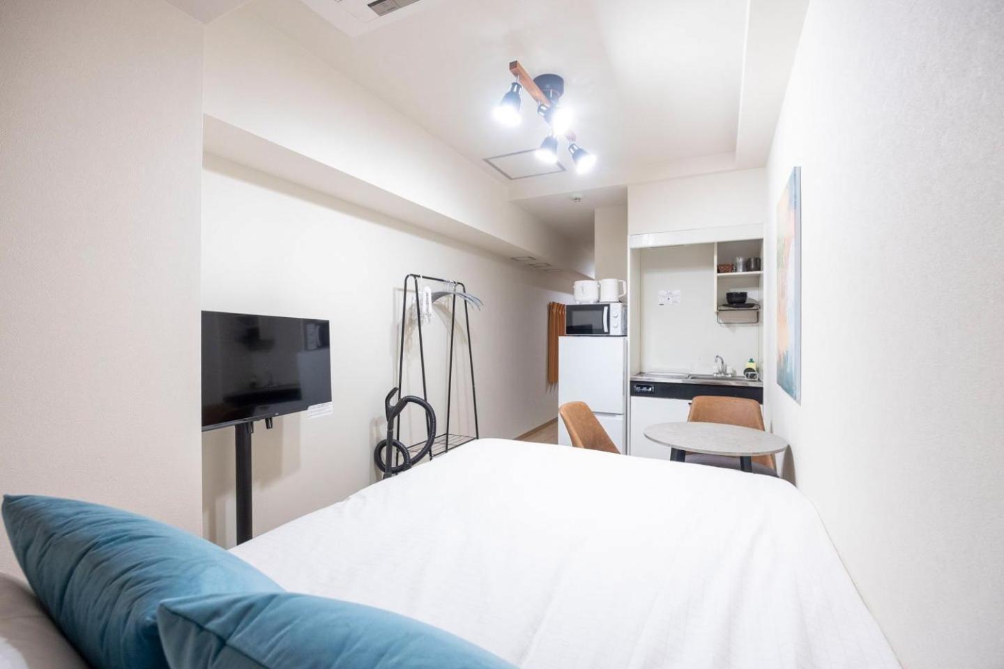 Ferienwohnung Shinjuku Okada Building Präfektur Tokio Exterior foto